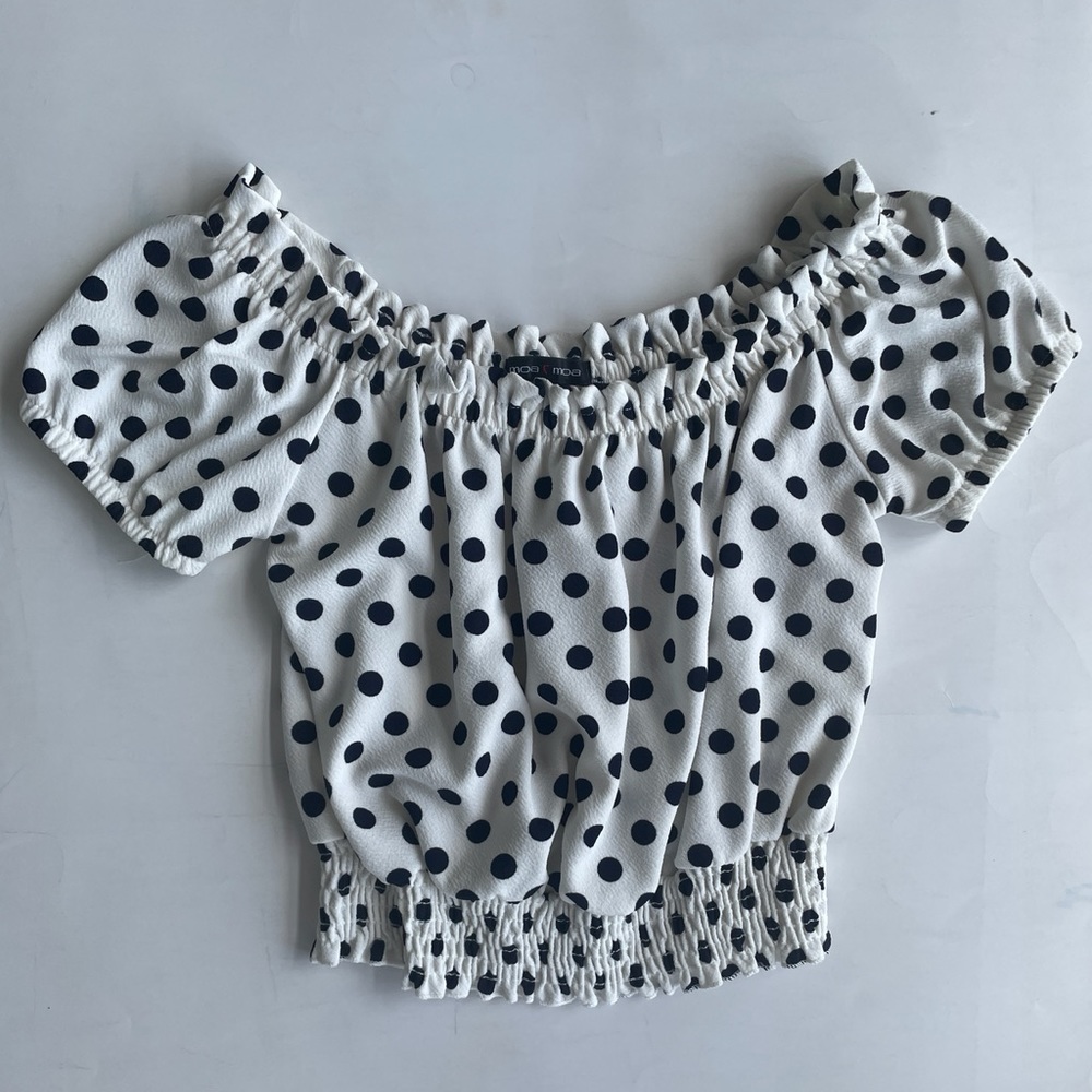 Polka dot short sleeve blouse.